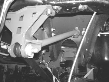 Locate FT30178 trac bar support bracket and attach first to the forward motor mount bolt on the driver side of the truck, then line the other end up to the trac bar bolt.
