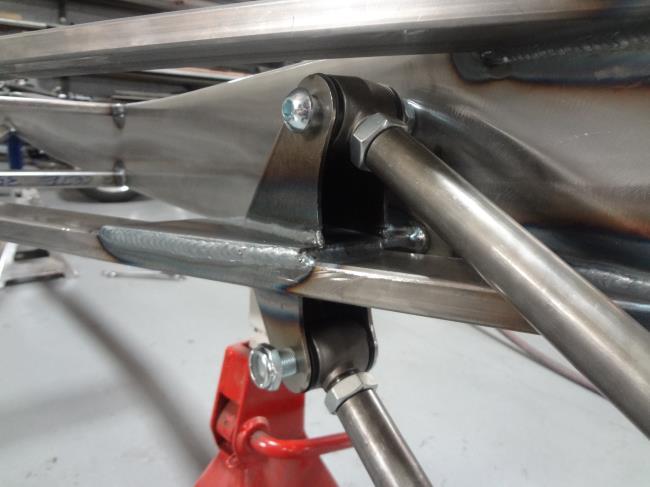 Install the 4-link bars with the adjuster side onto the frame using the provided 5/8 hardware.