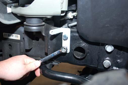 24. On the front sway disconnects, assemble the supplied jam nut and end link on the sway bar link body.