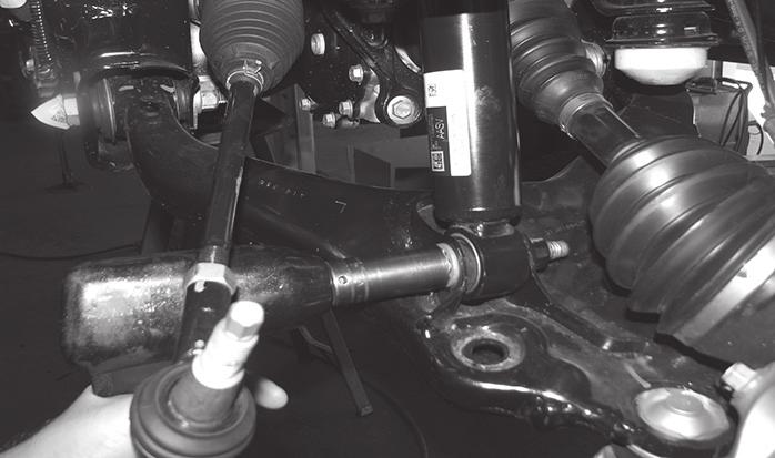 SEE FIGURE 4 FIGURE 1 - STEP 2 3. Disconnect the sway bar at the sway bar end link.
