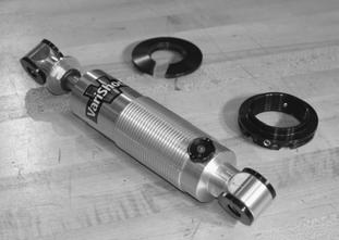 Installing Shocks and Springs The front suspension kit includes the VariShock Quickset 1 externally adjustable coilover shocks with