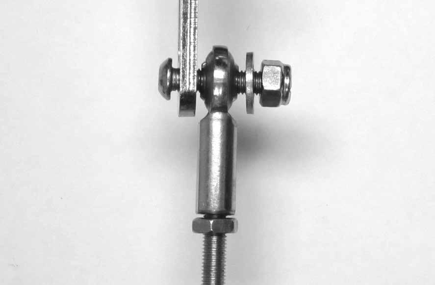 Fig. 10 Fig. 11 Rod End Trans Arm Flat Washer 1/4"-28 x 1" Button Head Bolt 1/4"-28 Switch Plate Neutral Safety Switch and Washer 1/4"-28 Jam Nut NOTE: The bolt can be installed from either side.
