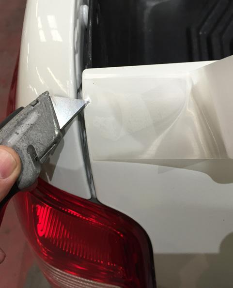 Apply the tape approx. 2-3mm from the edge of the tailgate. 4.