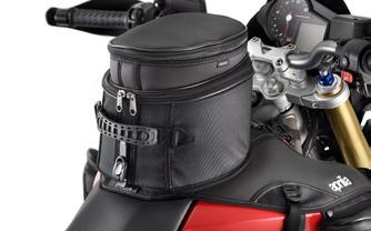 base with side pockets With shoulder straps Once the backpack is removed and worn, the base remains fixed to the bike without compromising passenger comfort Component made from twill weave