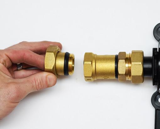 M-8100 manifold (8). Use two wrenches to tighten the Brass Bushing into the Union Nut. The angled valve set includes one Offset Adapter (9).