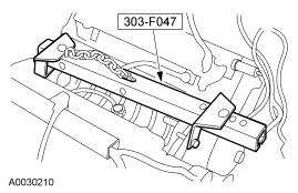 Page 39 of 41 100. Install the special tool and raise the engine. 101. Install the power steering reservoir lower mounting bracket. 102.