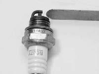 6. SPARK PLUG 660GC SERVICE MANUAL 6.5 Gap if necessary to 0.02 (0.5 mm).