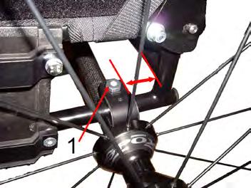 ADJUSTMENTS How to move the rear axle: (Fig. 16) 1) Remove the rear wheels 2) Loosen the nut casings (1) with the 22 mm cap key.