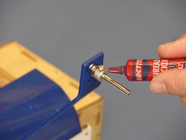 Use a drop of blue Loctite on the wheel collar set screw and tighten the wheel
