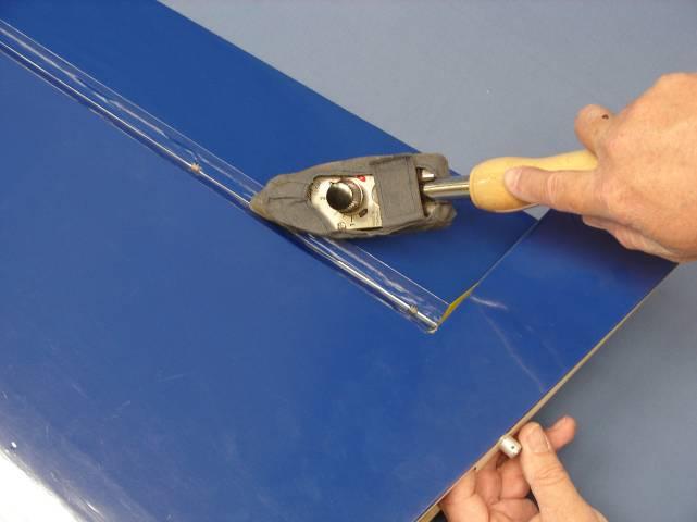 Use your covering iron to ensure all edges, seams, and color overlaps are securely sealed.