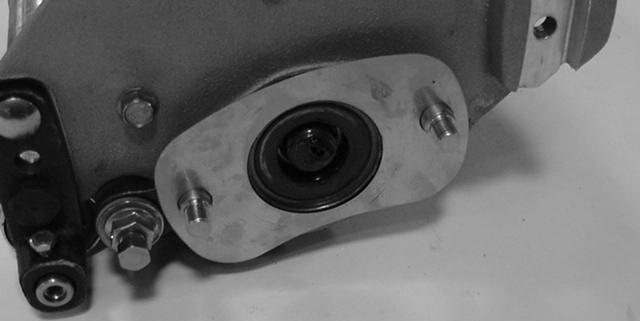 . Right hand groomer drive assembly Figure 6. Locknuts. Shim. Sideplate adapter Figure 4. Reel bearing locknut 8.