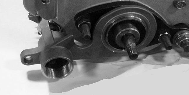 Remove the () nuts and the bolt securing the reel drive plate to the side plate (Fig. 5). Remove the drive plate assembly.