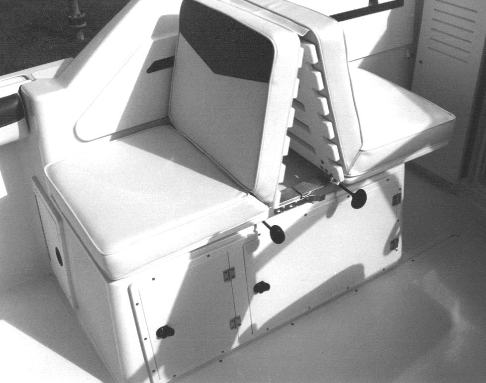 Helm Seat The helm seat is a pedestal seat that swivels and adjusts fore and aft. There are two levers and one tension knob on the seat base.