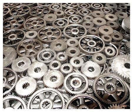 A gear is a rotating machine part having cut teeth, or cogs, which mesh with another toothed part in order to transmit torque.