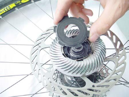 Installation: Attach the clutch and gear assembly to the rear wheel (see page 14).