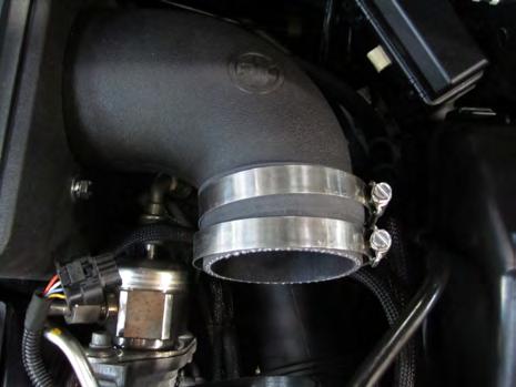 Push down on the stock turbo inlet tube to rotate it down back