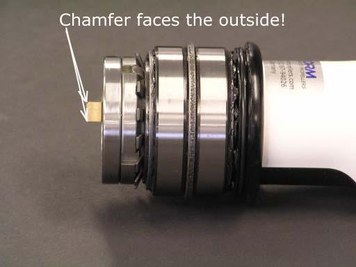 and the chamfer (bevel surface) the outside.