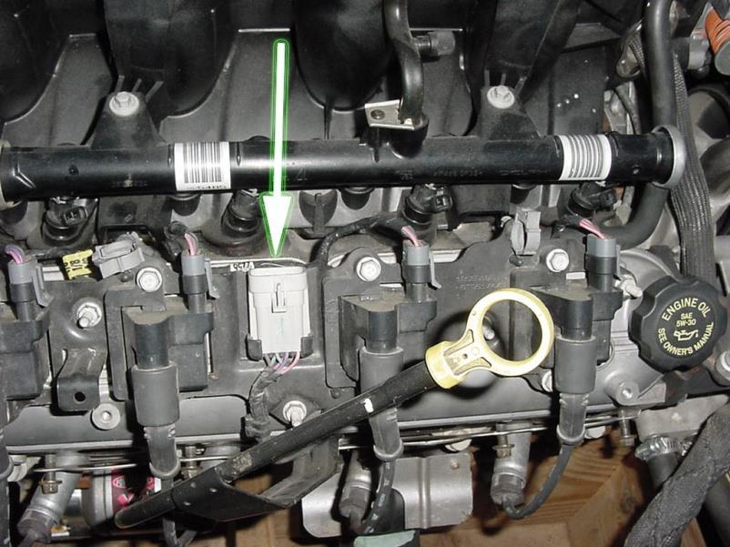 13. Plug the 4 black two pin passenger side injector connectors into their mating injector. #2 cylinder is at the front passenger side of the engine.
