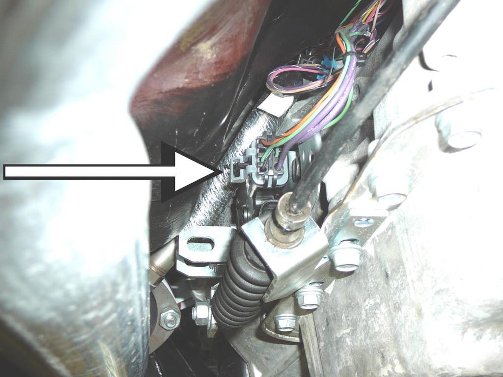 Plug the black four pin driver side oxygen sensor connector (labeled DRVR SIDE OXY) into the