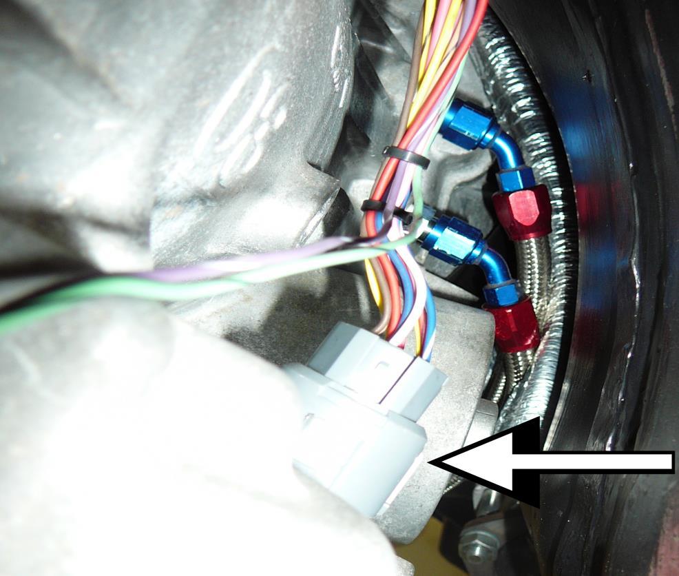 22. Plug the grey 13 pin 4L60E transmission solenoid connector (labeled TRANSMISSION) into the