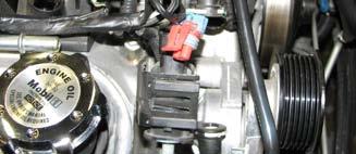 Use a 10mm socket to remove the seven remaining manifold bolts (out of ten).