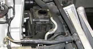 Use a 13mm socket to remove alternator power wire.