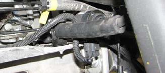 Remove the plastic clamp holding the power steering lines to the steering rack. 68.