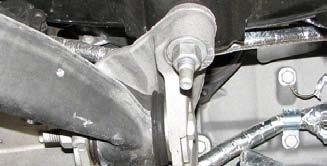 Insert a pry bar between the frame and front driver side cradle mount. 76.