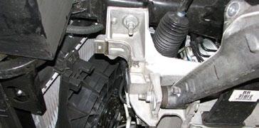 18mm line wrench to disconnect the two power steering