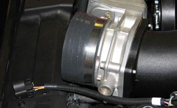 Route the supplied MAF wire harness near the driver side of the throttle body. 211.
