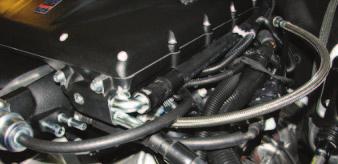 90. Then route the hose behind the manifold and install it onto the driver side manifold outlet barb.