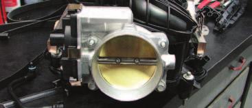 107. Using a 10mm socket, remove the factory throttle body from the