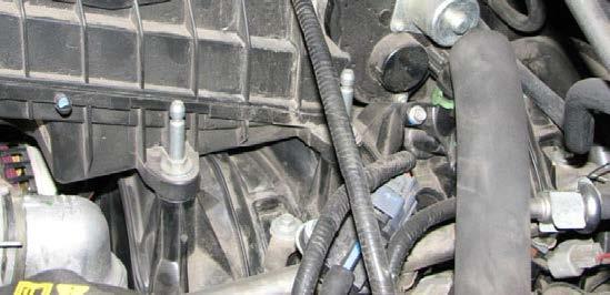 Remove the bolt that retains the air inlet resonator tube in place.