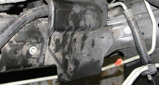 74. Use a 10mm socket to unbolt and remove the oil splash shield. 78.