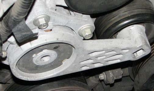 Remove the three bolts holding the belt tensioner in place, and remove the tensioner. 108.