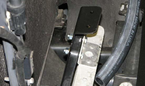 Secure the water pump to the bracket using the strap and the M8 x 30mm bolt supplied in Bag #5.