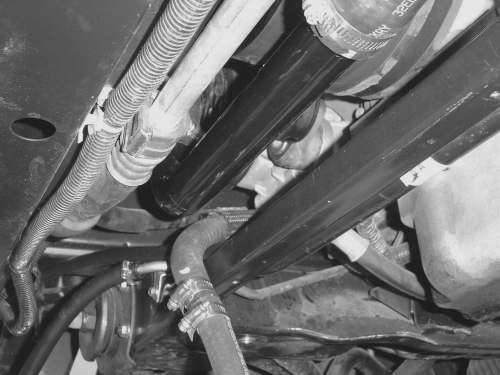 9) Connect the coolant reservoir hose to the installed 3/4" heater hose using the supplied 3/4" hose joiner and hose clamps.