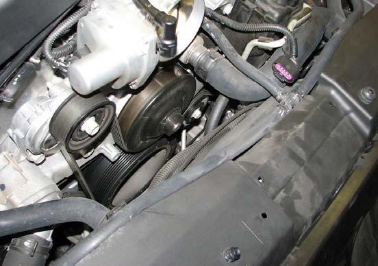 22. Use a 10mm socket to remove the four bolts holding in the throttle body and set it aside. 18.