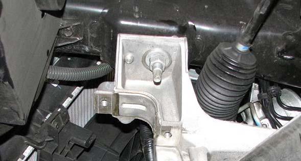 73. Use a 21mm deep socket to remove the two front engine cradle bolts. 78.