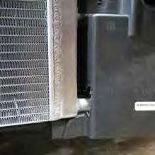 cooler hoses. Install radiator shrouds using the factory hardware. Proceed to Step 130. 123.