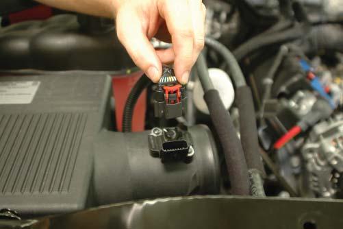 45. Disconnect the airbox MAF plug from the airbox on the right side of the vehicle.