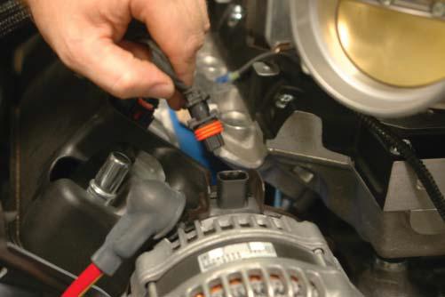 Connect the alternator control plug to