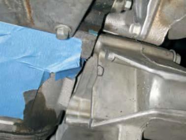 Use a felt tip marker and mark the alternator bracket were the coolant vent pipe hits as