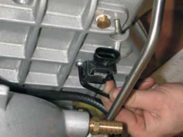 64. Using a 4mm allen wrench, install the MAP sensor retaining