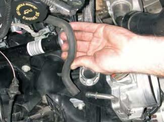 Remove the (PCV) vent hose from the throttle body or intake