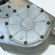 The shaft should pass through the slide ring, gear, thrust washer, and bearing installed in steps
