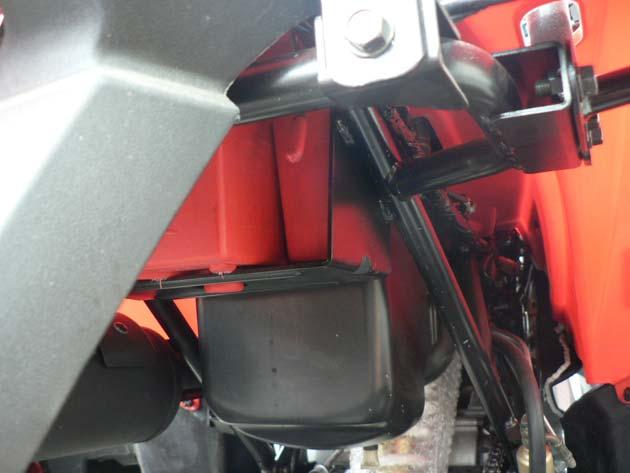 How to mount the seat: Push the retaining tab under the front seat into the holder on the frame.
