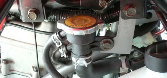 * In case that coolant drips on the painted surface, immediately rinse it with clean water. Radiator cap <How to drain coolant> 1. First remove the front cover 2.