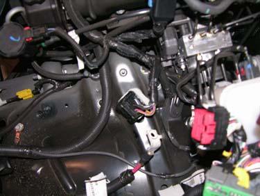 Reinstall the air cleaner assembly on the right side,