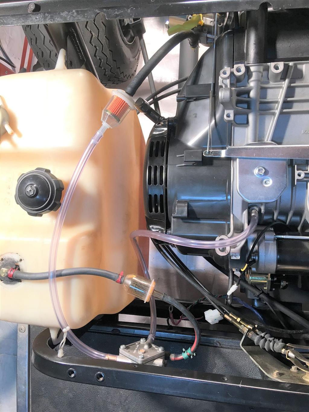 When setting up your fuel system, make sure the yellow vent screen on the fuel pump is pointed upwards. Use the clear fuel line provided to plumb the fuel system as shown below.